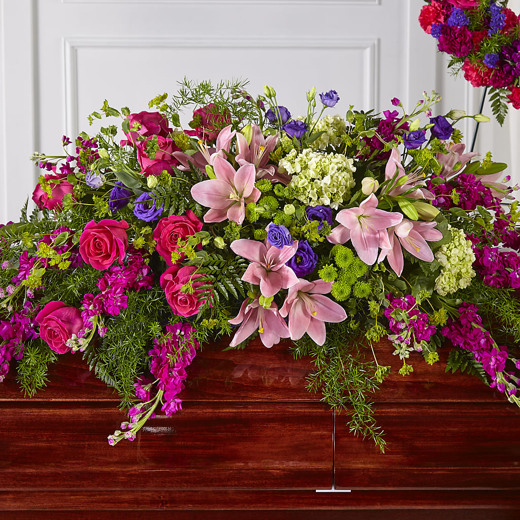Radiant Tribute Casket Spray – LESLIE'S FLOWERS & PARTY SUPPLIES, Howell NJ