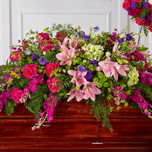 Radiant Tribute Casket Spray – LESLIE'S FLOWERS & PARTY SUPPLIES, Howell NJ